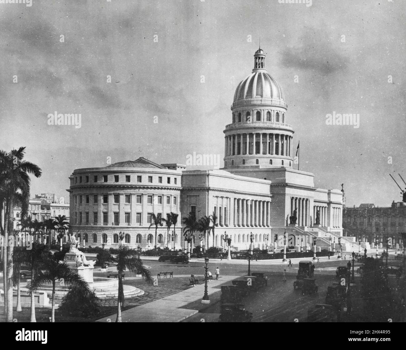 Scene Of Havana Riots -- The Cuban Capitol in Havana in front of which thousands congregated today and clashed with the police and military authorities when, acting on a rumor, the crowd started to celebrate the false report of President Machado's resignation. July 08, 1933. (Photo by Wide World). Stock Photo
