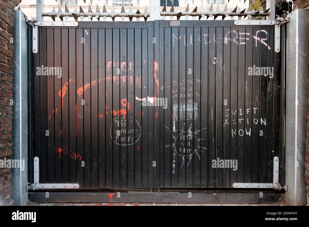 London UK, 9th March 2022. Gates to the  Russian Embassy daubed with anti-Putin slogans. Stock Photo