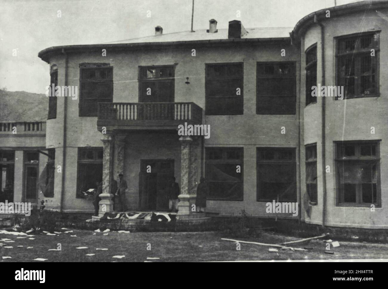 The Embassy of Pakistan and Pakistan Ambassador's residence in Kabul was raided and looted on March 30th. The Pakistan flag which was forcibly removed by the officially organized mob. The flag can be seen on the porch. June 6, 1955. Stock Photo