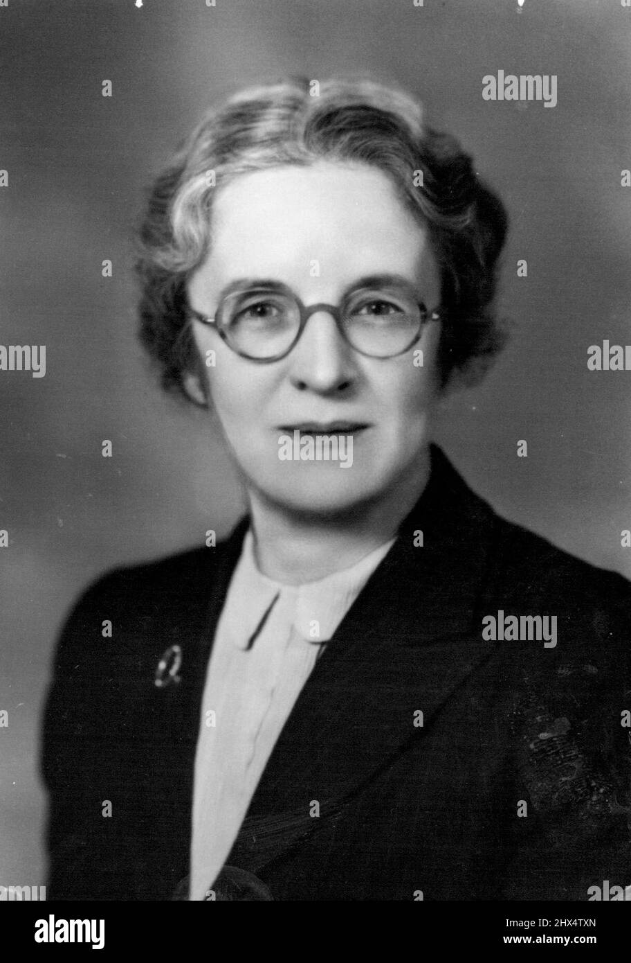 Mrs. D.R. Hall, formerly Miss Frances Perkins, whose marriage took place in London on March 22nd to The Hon. David R.Hall, former Attorney-General of New South Wales, and former Minister of Justice of Sydney, N.S.W. and of Portland Place, London. Mrs. Hall comes from Dunedin, New Zealand, and has lived in Malaya, and Ceylon. She is the elder daughter of the late Alexander Campbell ***** well-known Consulting Mining Engineer, of New Zealand & Malaya. June 25, 1944. (Photo by Pearl Freeman). Stock Photo