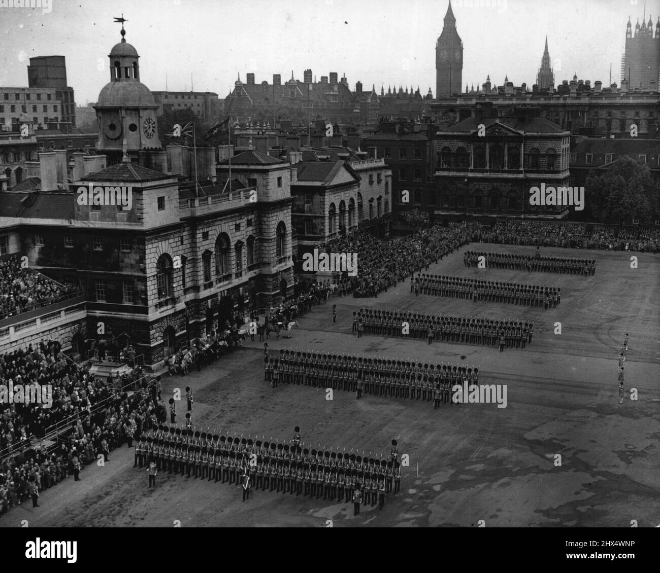 Trooping The Colour Rehearsal -- A general view of the scene on the Horse Guards Parade this morning as the Guards marched past the Duke of Gloucester during the dress rehearsal of Trooping the Colour rehearsal. May 30, 1952. Stock Photo