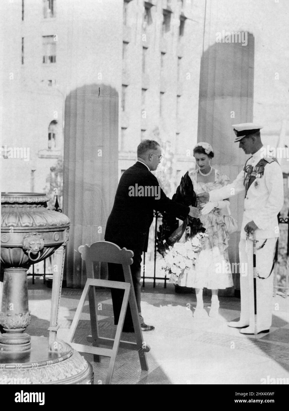 It was a solemn moment for the Queen as she placed a wreath on the
