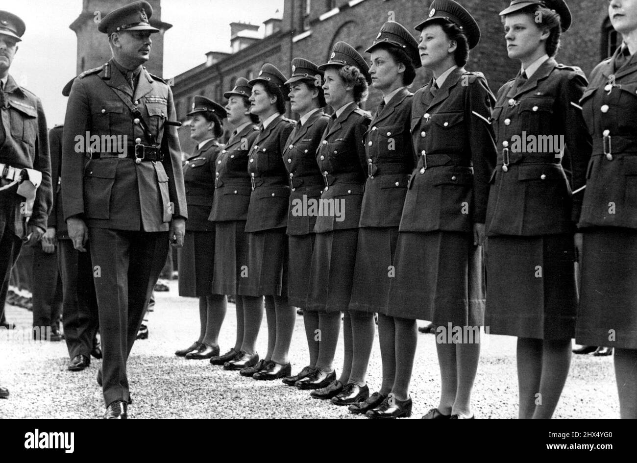 Redcaps Royal Corps. The Duke of Gloucester inspecting the ATS