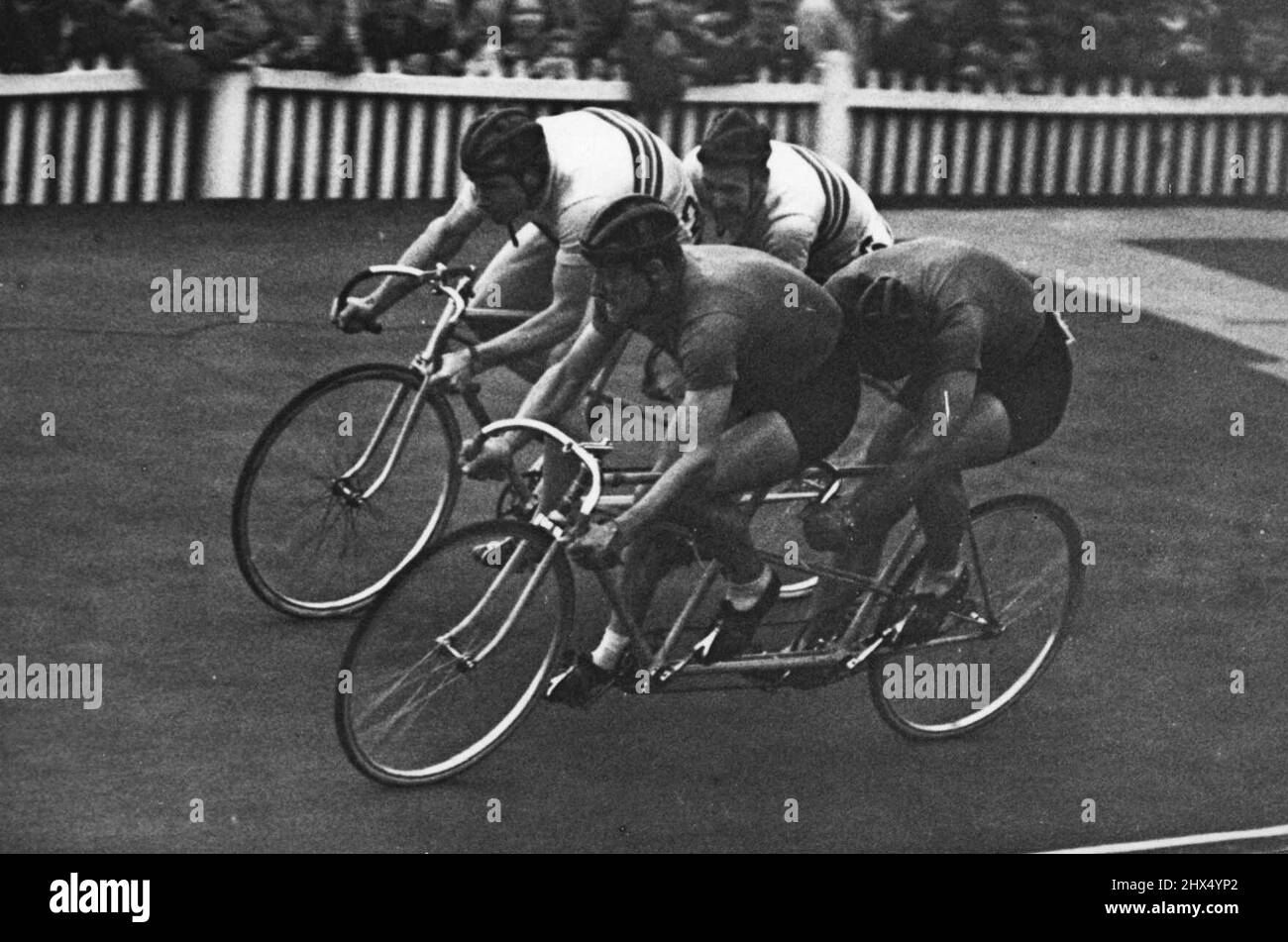 The XIVth Olympiad: Italy beat Great Britain in the 2000 metres Tandem sprint at Herne Hill. Teruzzi and Perona, Italy, nearest camera, pulling away from Harris and Bannister Great Britain, to win two of the three heats in the final of the 2000 tandem sprint. October 08, 1948. (Photo by Sport & General Press Agency, Limited). Stock Photo