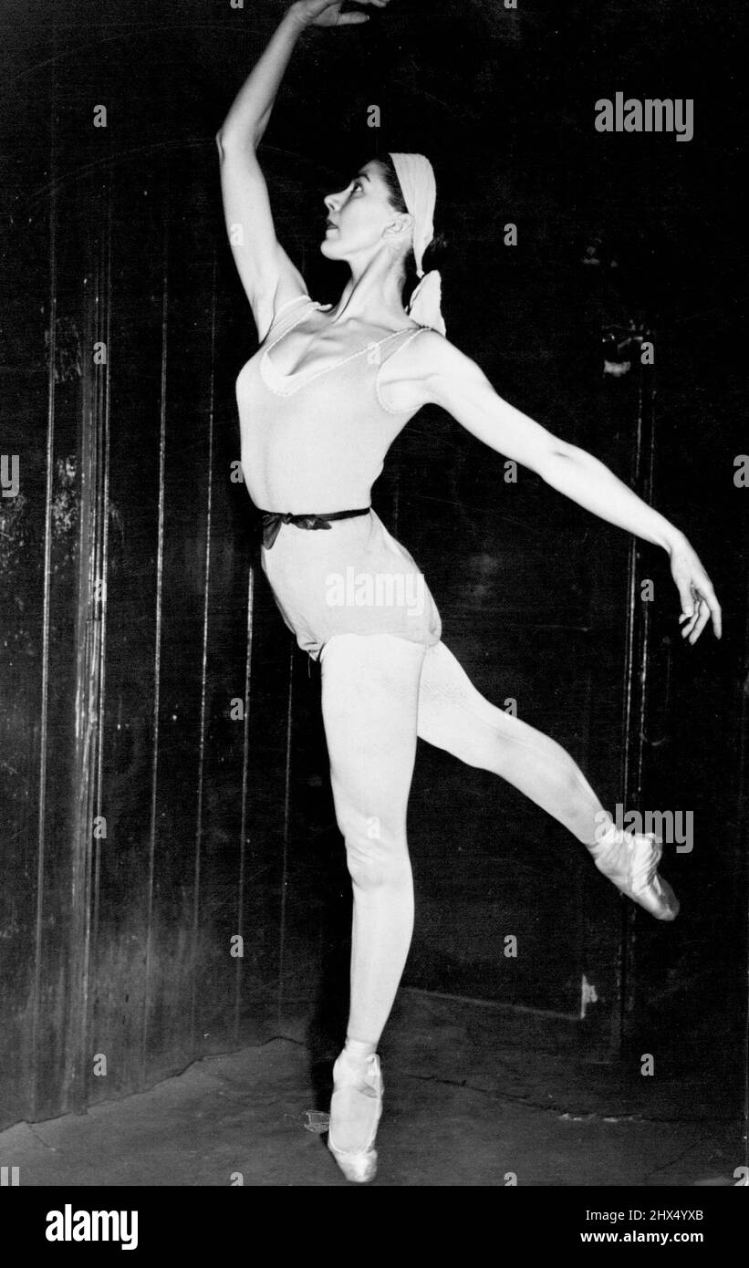 Injured Margot Dances Again -- The lissome Margot practicing in London to-day. Margot Fonteyn, the Sadlers Wells prima ballerina, who has had her foot in plaster for two months following a fall on the stage, is now getting ready for her return to the ballet at Covent Garden on February 25. February 11, 1949. (Photo by Fox Photos) Stock Photo
