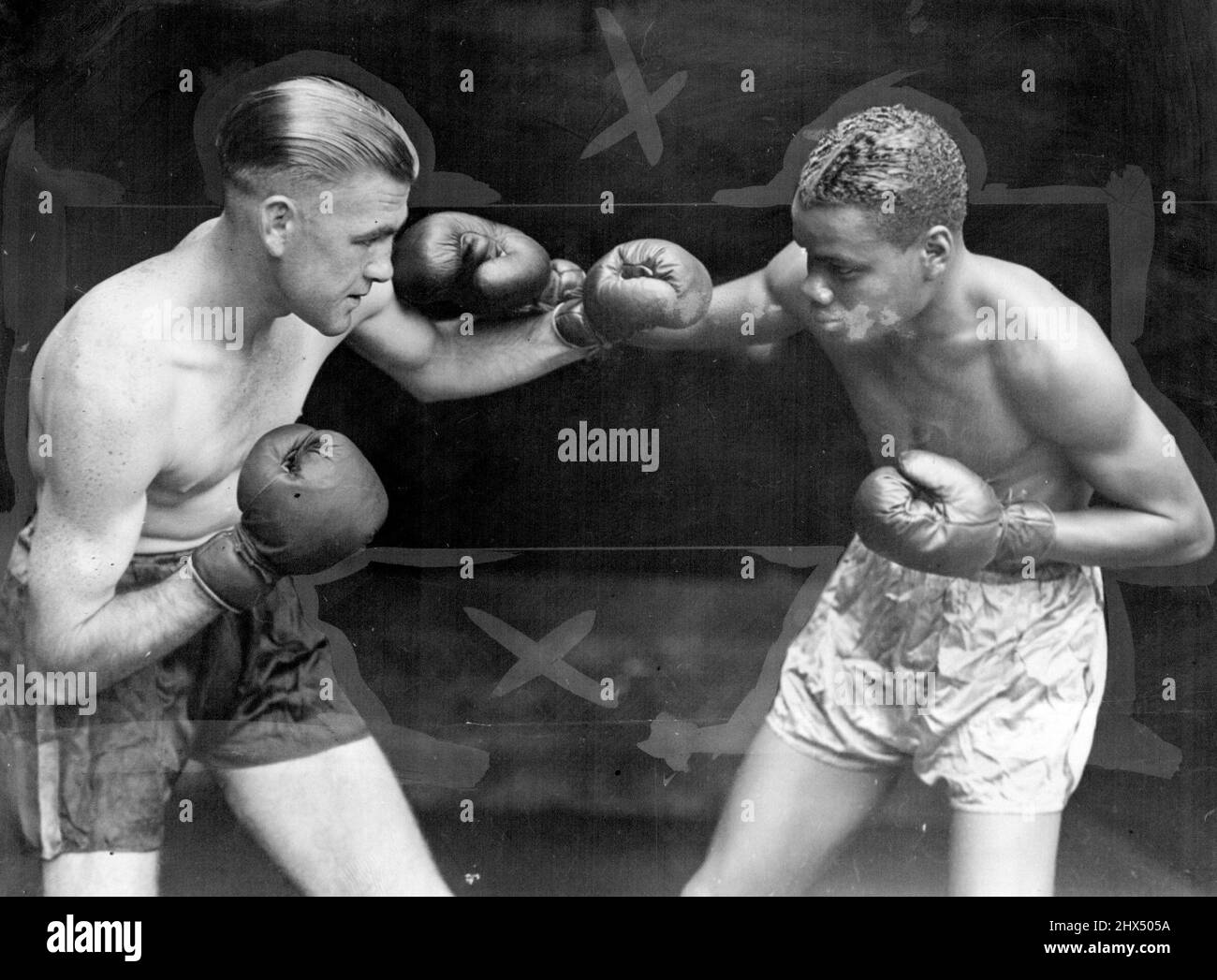 Alf Blatch, Australian lightweight champion (left) and Tiger Flowers, who has yet to fight before the Sydney public. They will meet next Monday night at the Stadium. February 14, 1936. Stock Photo
