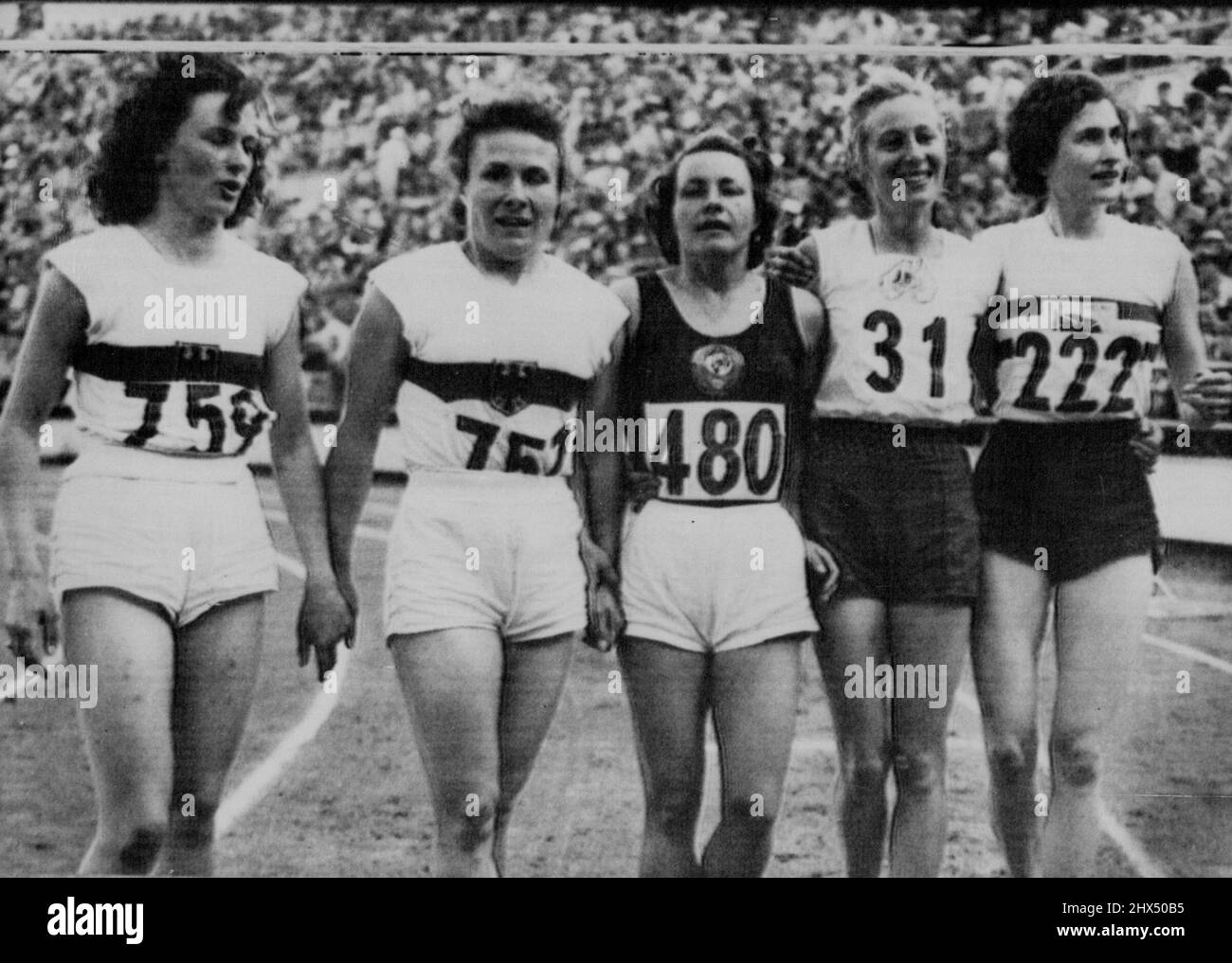 Finalists After Final -- Missing from this group of finalists after the final of the women's 80-metre hurdles event at Helsinki today July 24 is Fanny Blankers-Koen of Holland, who tipped a hurdle and retired from the event. Fanny has been unwell during the last few days. Left to right : Anneliese Seonbuchner of Germany (who finished 4th), Maria Sander of Germany (3rd), Marija Golubichnaja of Russia (2nd), Shirley Strickland of Australia (1st), and Jean Desforges of Britain (5th). July 24, 1952. (Photo by Olympic World Photo). Stock Photo