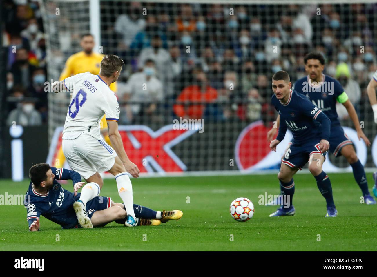 Toni Kroos of Real Madrid and Lionel Messi of PSG in action during the UEFA Champions League, Round of 16, 2nd leg football match between Real Madrid and Paris Saint-Germain on March 9, 2022 at Santiago Bernabeu stadium in Madrid, Spain - Photo: Oscar Barroso/DPPI/LiveMedia Stock Photo