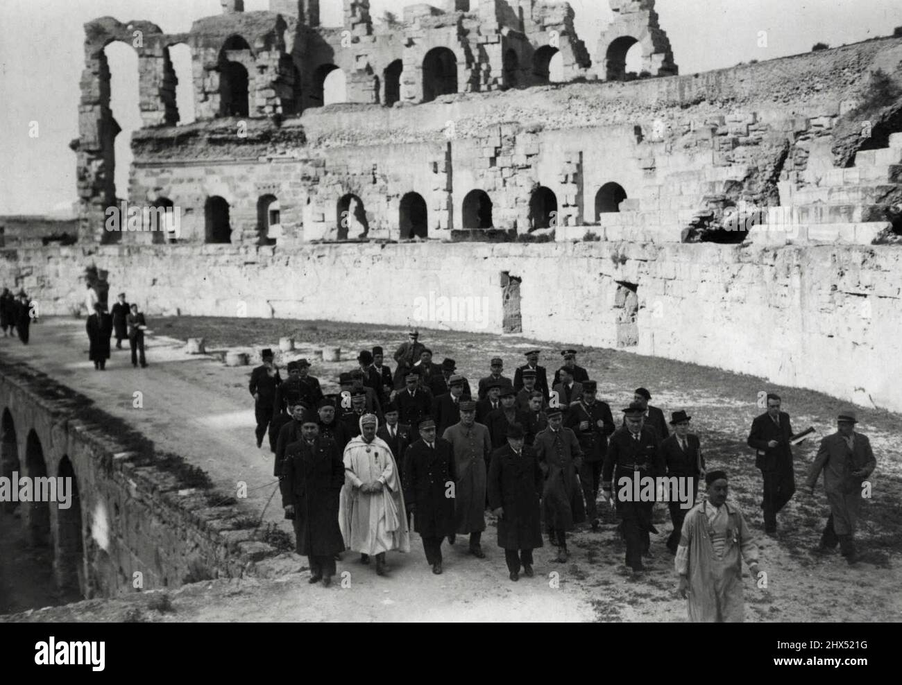 French Prime Minister's Tour of Tunisia -- Monsieur Daladier when he visited the Coliseum at El Djem during his tour of Tunisia. February 20, 1939. Stock Photo