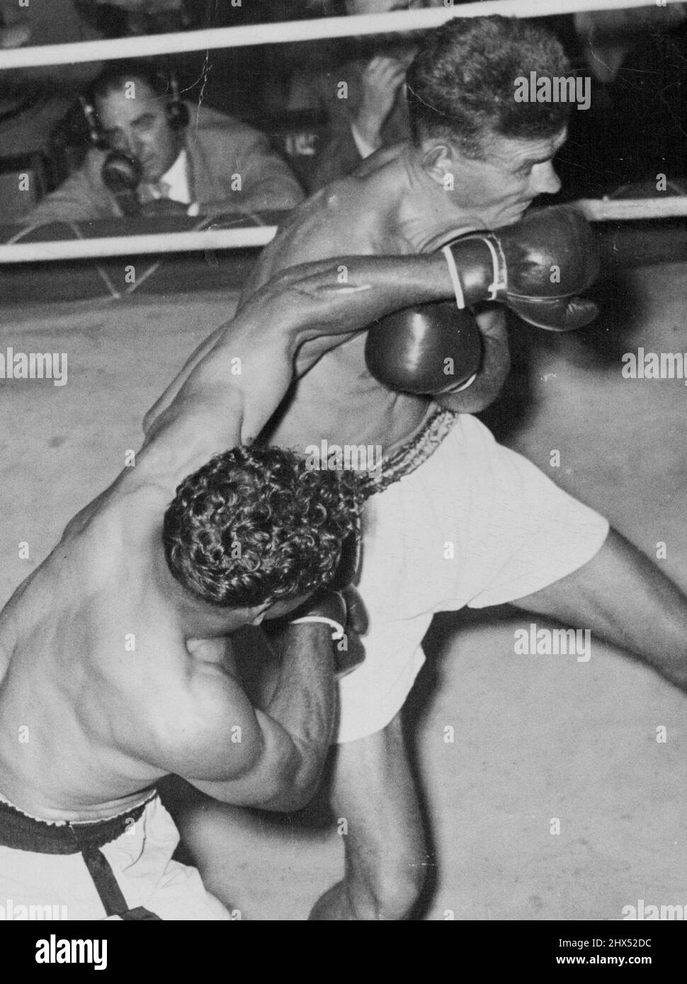 Alf Sands lands a left to the chin in his points win over Al Bourke at the Stadium last night. Bourke, who is Australian middleweight champion, was clearly beaten. February 10, 1953. Stock Photo