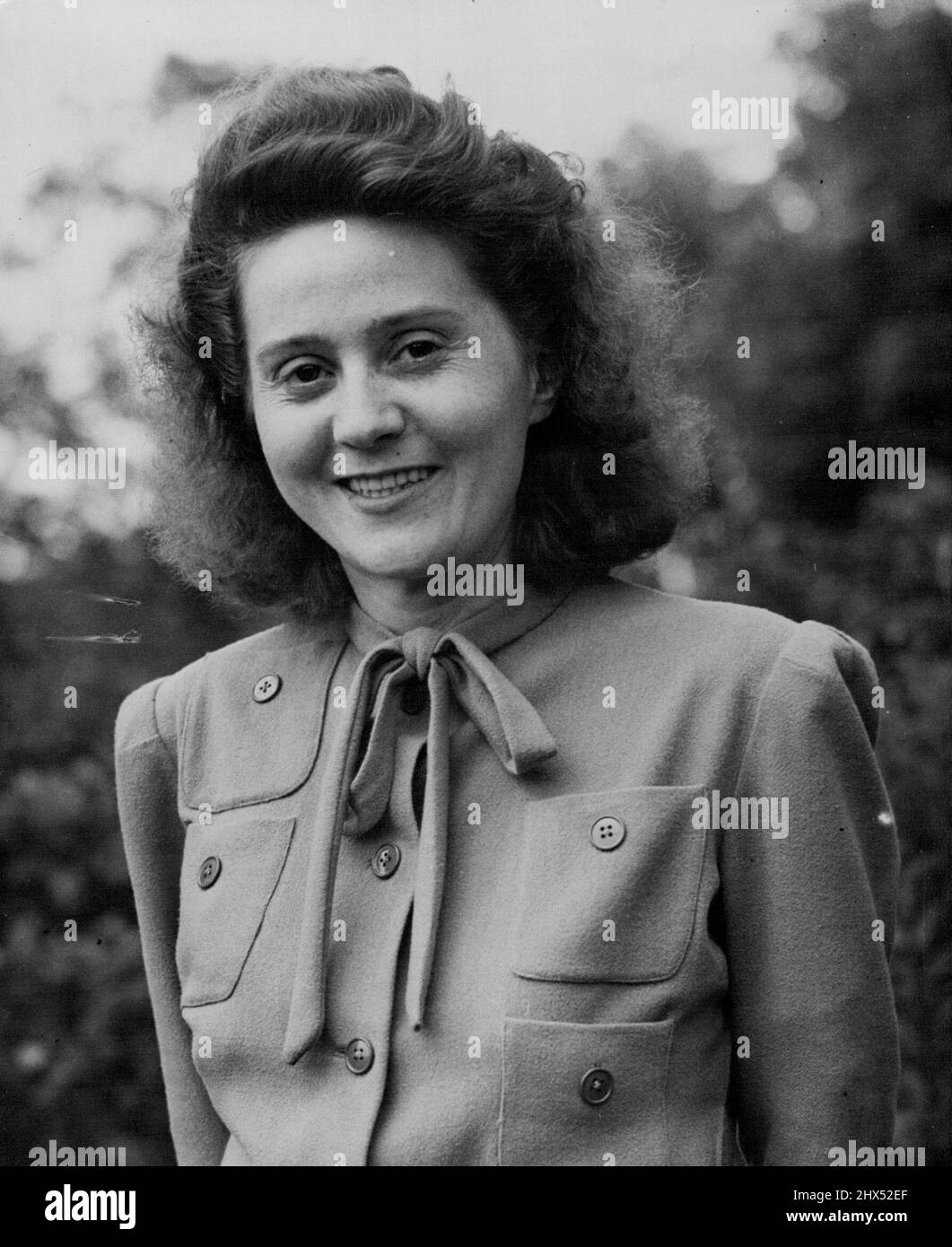 The Silent Woman -- Mrs. Odette Marie Celina Sansom, G.C., M.B.E. photographed to-day, Tuesday, while on holiday in Hampshire. The award of the George Cross to a British woman who refused to betray her comrades under Nazi torture was announced to-day, Tuesday,. sent into occupied France, Mrs. Odette Marie Celina Sansom, MBE, was arrested by the Gestapo. The Germans needed information about two officers, but despite torture inflicted with a hot iron and the removal of all her toe nails, Mrs.Sansom kept silent. August 20, 1946. Stock Photo