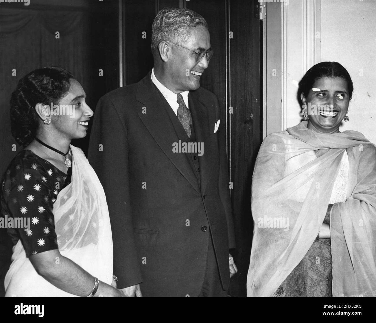 The Begum Rahman wife of the High Commissioner for Pakistan with Minister for Philippines Dr. Robert Regala & Mrs. A. Alvie. September 04, 1955. Stock Photo