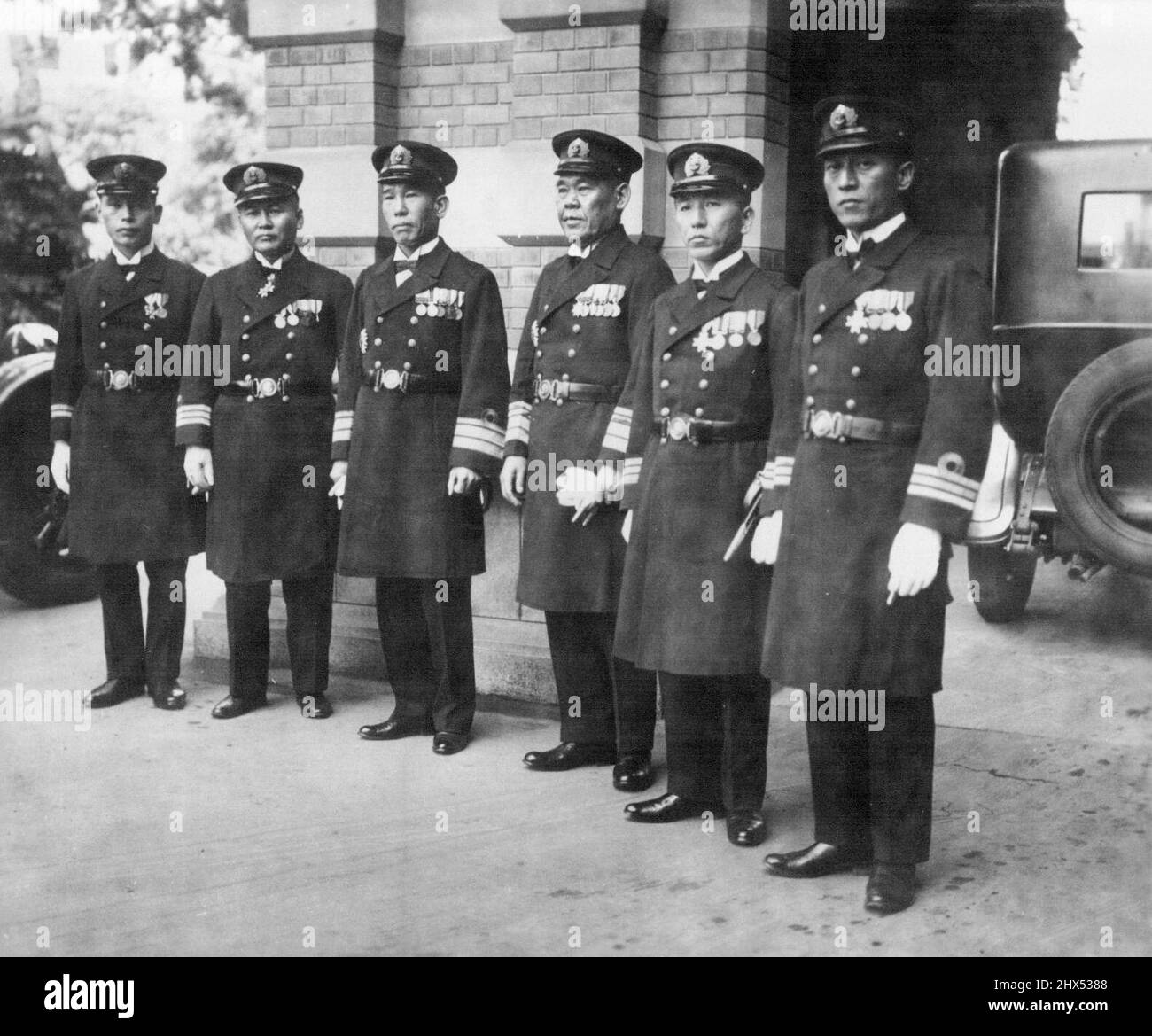 His Majesty the Emperor entertained the Japanese Naval representatives for the coming Disarmament conference in the Imperial Palace. The third from right, is Vice-Admiral Nagano, chief of the naval representative with his suits pictured at the Naval Ministry. December 5, 1932. Stock Photo