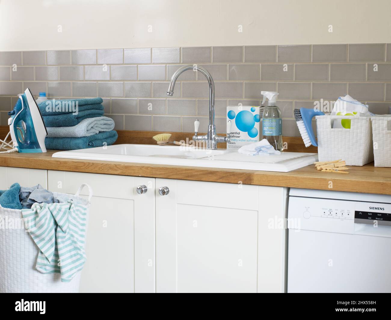 Sink unit in laundry room Stock Photo Alamy