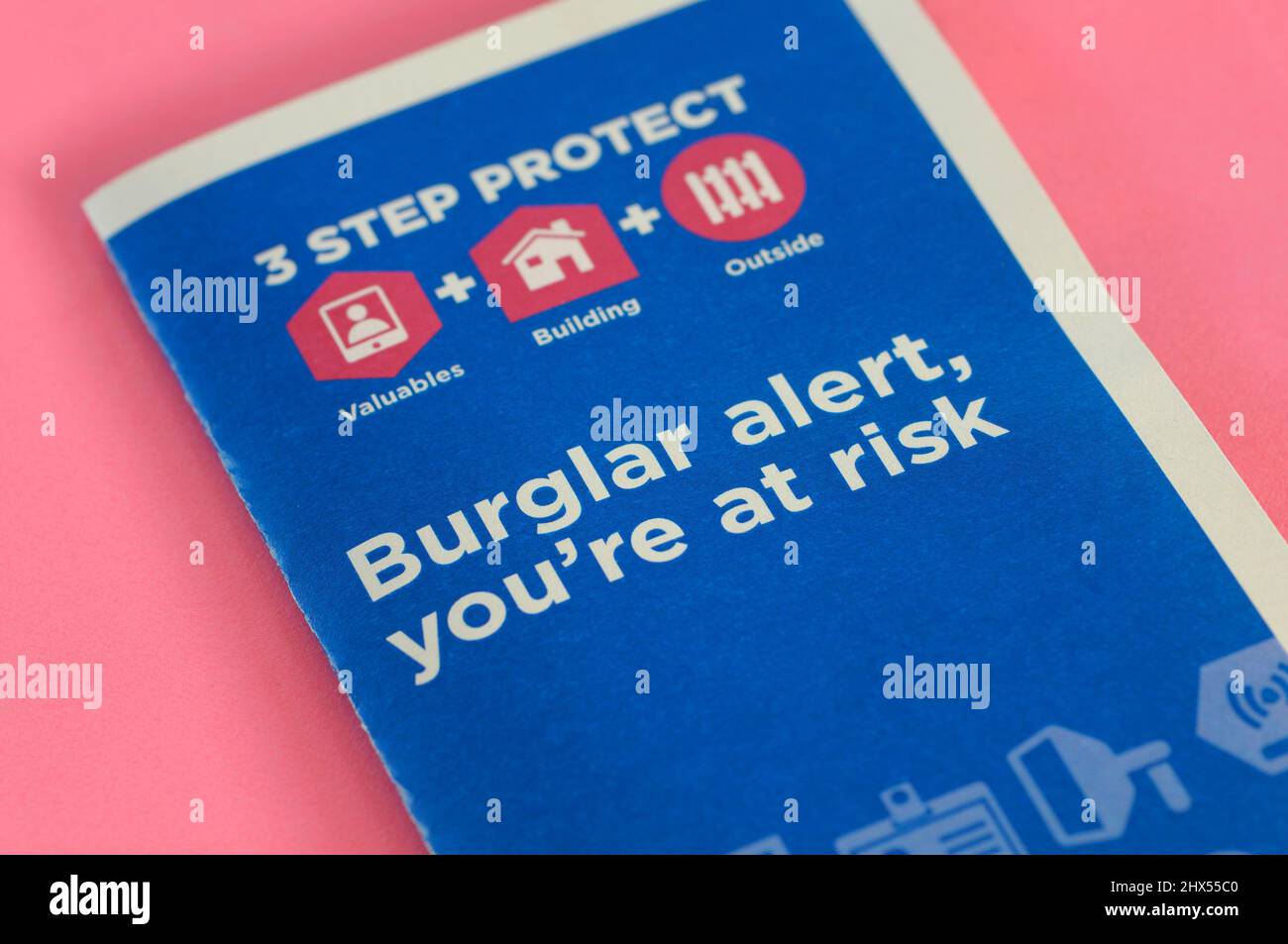 A leaflet from the police posted to homeowners warning of a recent burglary in the immediate area and to be vigilant.  England, UK Stock Photo