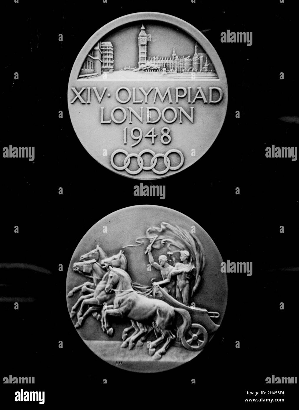 For the 1948 Olympiad -- The obverse and reverse of the Olympics medal, pictured today (Tuesday) at London factory of Messrs. John Pinches, responsible for their manufacture.Medals now being struck for successful competitors in the forthcoming Olympic Games, to be held in London, are to be of oxydised silver instead of gold, as hitherto. The medals which bear a symbolic Grecian chariot on the obverse, have depicted on the reverse an  impression of the Palace of Westminster, the fire interwined circles representing the five Continents, and the legend: XIV Olympied London 1948.Olympiad Medal. Au Stock Photo
