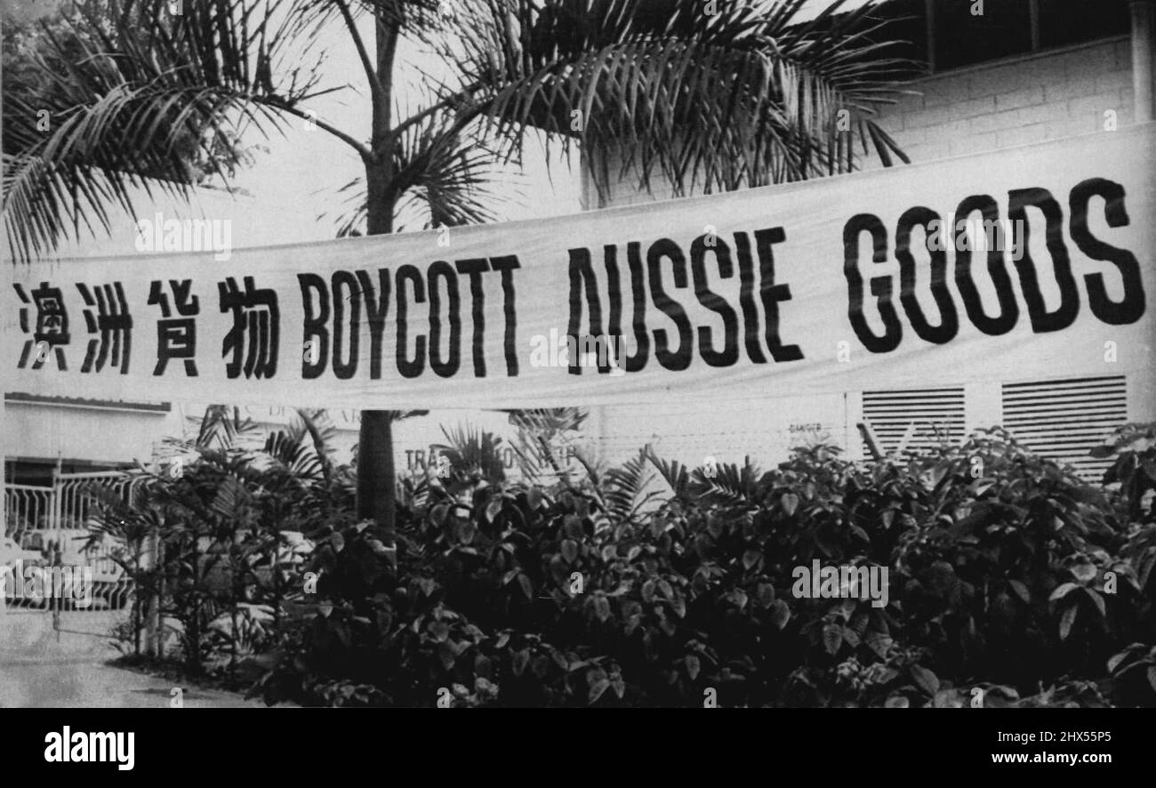 A banner proclaiming 'Boycott Aussie Goods' outside the National Trades Union Congress (NTUC) building at Shentonway. The NTUC has called Singapore workers not to by Australian goods for one month form June 24 to condemn the Season's Union of Australia holding the 3,000 ton Pacific Viking in Sydney since June 10. June 27, 1952. (Photo by AP Radiophoto) Stock Photo