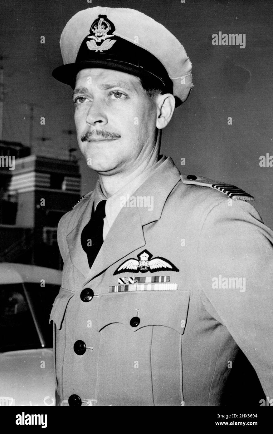 Wing Commander J. R. Kinninmont, Co, of 77 Squadron in Korea, was another passenger on the plane. February 12, 1953. Stock Photo