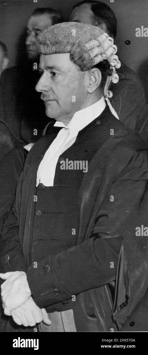 Hon. P.C. Spender, Kings counsel Minister for Army photographed on occasion of farewell to Sir George Beeby chief judge of arbitration court. April 15, 1942. Stock Photo