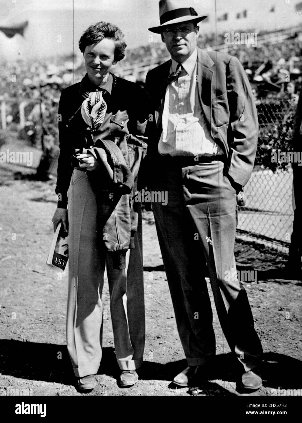Amelia Earhart and her husband George Palmer Putnam posing together at an outdoor event.Putnam-No.8. March 04, 1938. Stock Photo