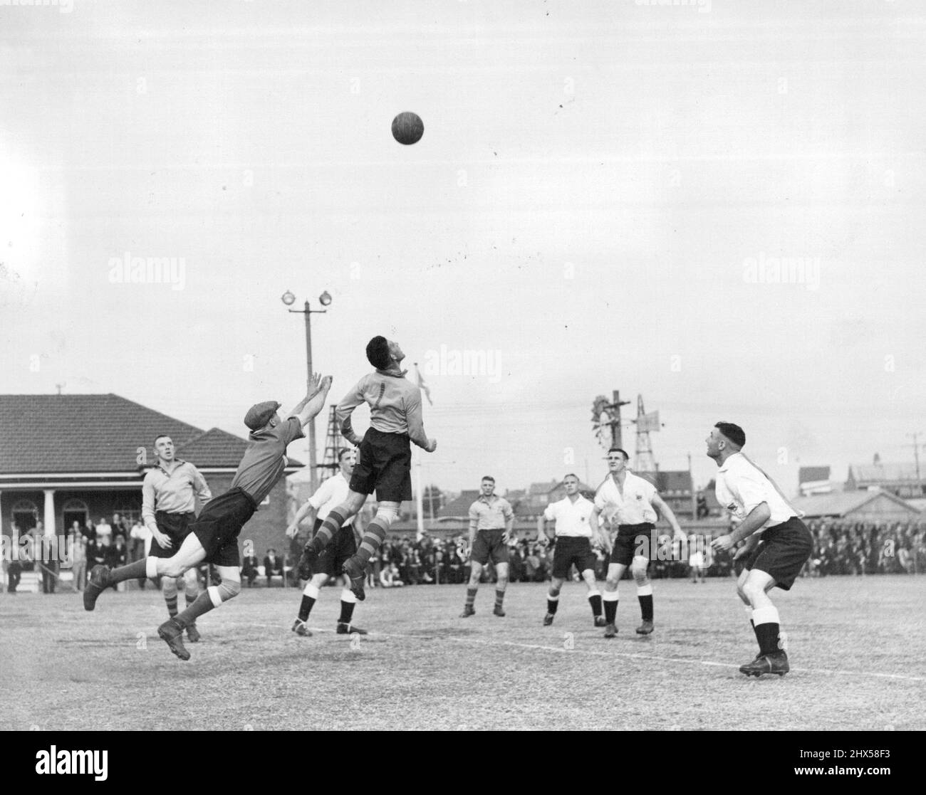 Australia V NWS Arlington Park. Last week's Soccer photo stumped most, although the player wearing No 1 was almost certainly Jack 'Digger' Evans. Other players mentioned were Eddie Hodge, Jimmy Osborne, Jimmy McNab, John Fox, Ian Davison and Roy Crowhurst. The nostalgia photo this week is of a Soccer match played at Arlington Park in May, 1936, between Australia and New South Wales. I would be grateful for identification of the players. You may write to me at The Sun Herald, GPO Box 506, Sydney, 2001. May 1, 1936. Stock Photo