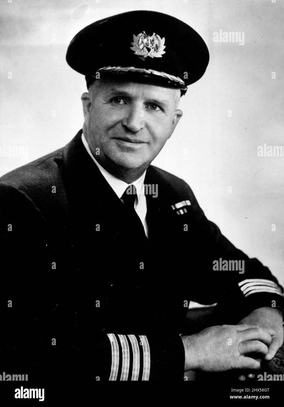 Captain of the Royal Tour Ship : Captain David Aitchison -- He will be in command of the S.S. 'Gothic' when H.M. The Queen and H.R.H. The Duke of Edinburgh sail for New Zealand and Australia. Captain Aitchison has been with the Saw Savill & Albion line since 1919; took command of the 'Gothic' in April, 1953. November 03, 1953. (Photo by Camera Press) Stock Photo