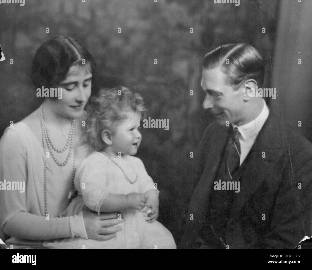 New portrait King & Queen and Princess Elizabeth. January 14, 1937. (Photo by Marcus Adams, The Herald). Stock Photo