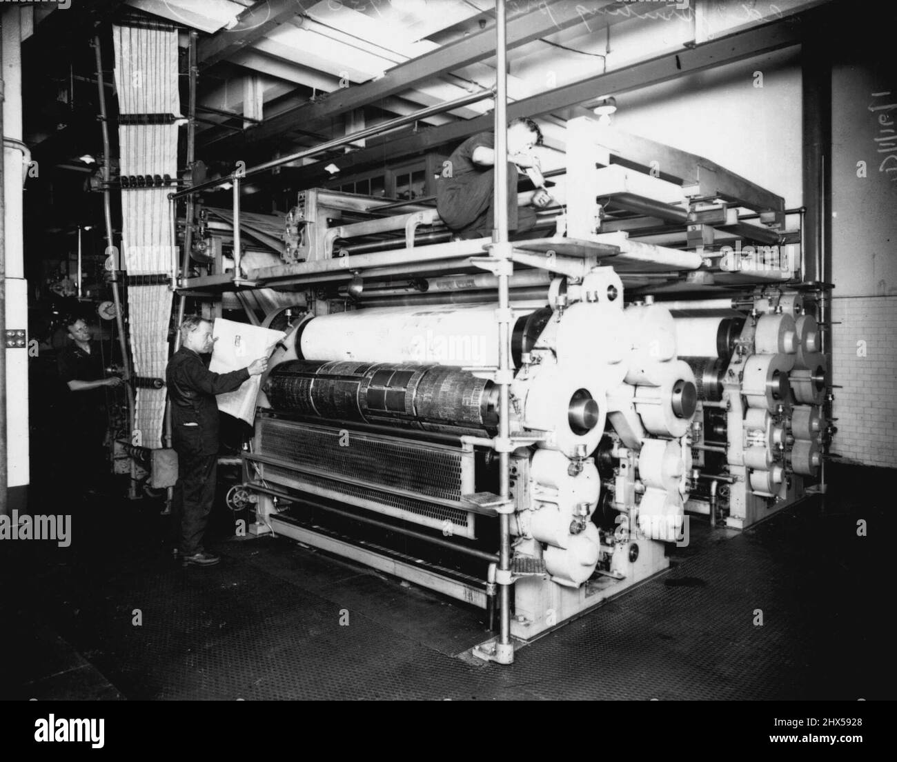 Herald presses. January 1, 1930. (Photo by Herbert Fishwick/Fairfax Media). Stock Photo