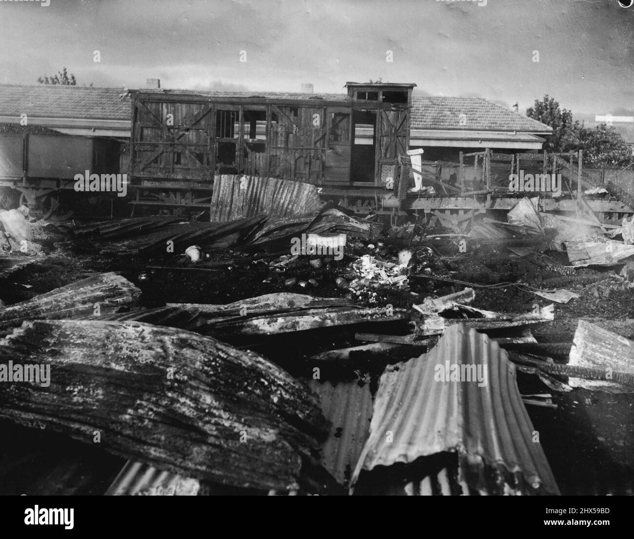 Goods shed at Yallourn station after fires had hassel. March 6, 1944. Stock Photo