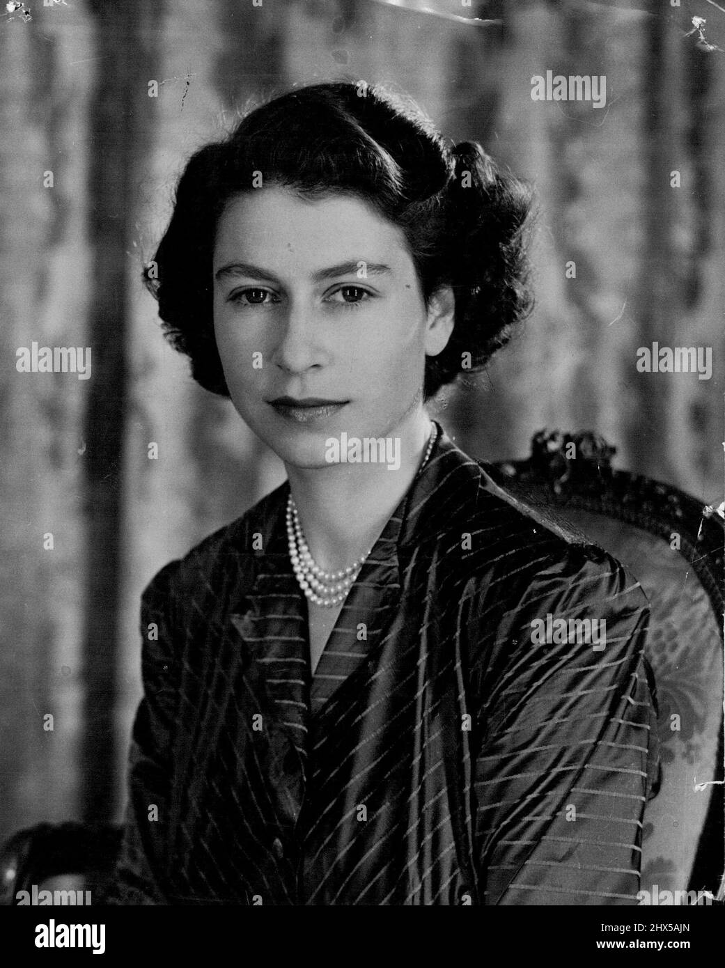 Princess Elizabeth, who is visiting Italy, celebrated her 25th birthday today. She and her husband. the Duke of Edinburgh, attended a lavish dinner dance organized by the Rome Polo Club last night. April 21, 1951. (Photo by Baron Photo Centre Ltd.). Stock Photo