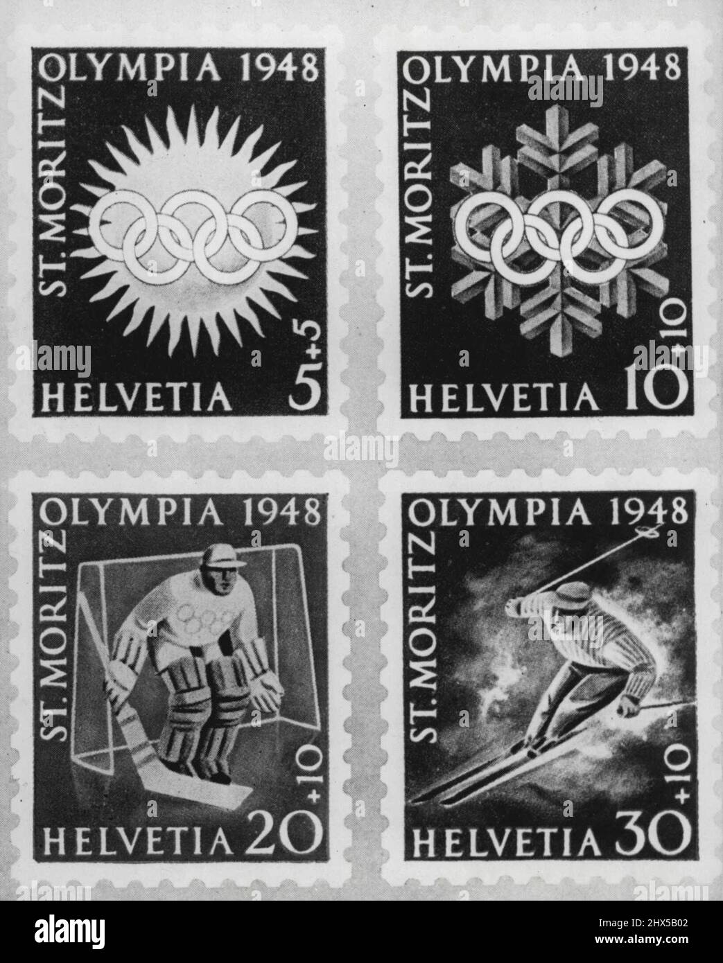 Swiss Stamps To pay Olympic Costs - The four new Swiss Olympic stamps, which will be in use as from today. The amount of surtax on each is shown as plus to the original cost. The Swiss Government, which has guaranteed a sum of 350,000 Swiss francs to meet the cost of the ten days' Olympic winter Games at St. Moritz, have issued a series of four special Olympic stamps of 5, 10, 20 and 30 centimes, each with a surtax, the sales of which are expected to defray half of the guaranteed amount. Januray 15, 1948. (Photo by Fox). Stock Photo