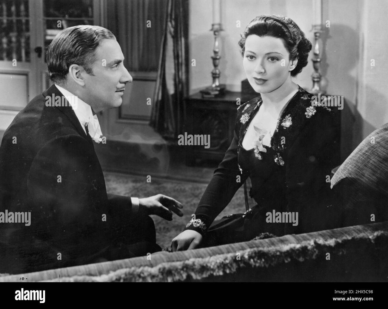 Mary Ellis in 'Fatal Lady' with Walter Pidgeon, John Halliday, Ruth Donnelly. Alan Mowbray. Guy Bates post. Samuel Hinds and Norman Foster. A Walter Wanger Production. A Paramount Picture. June 05, 1939. Stock Photo