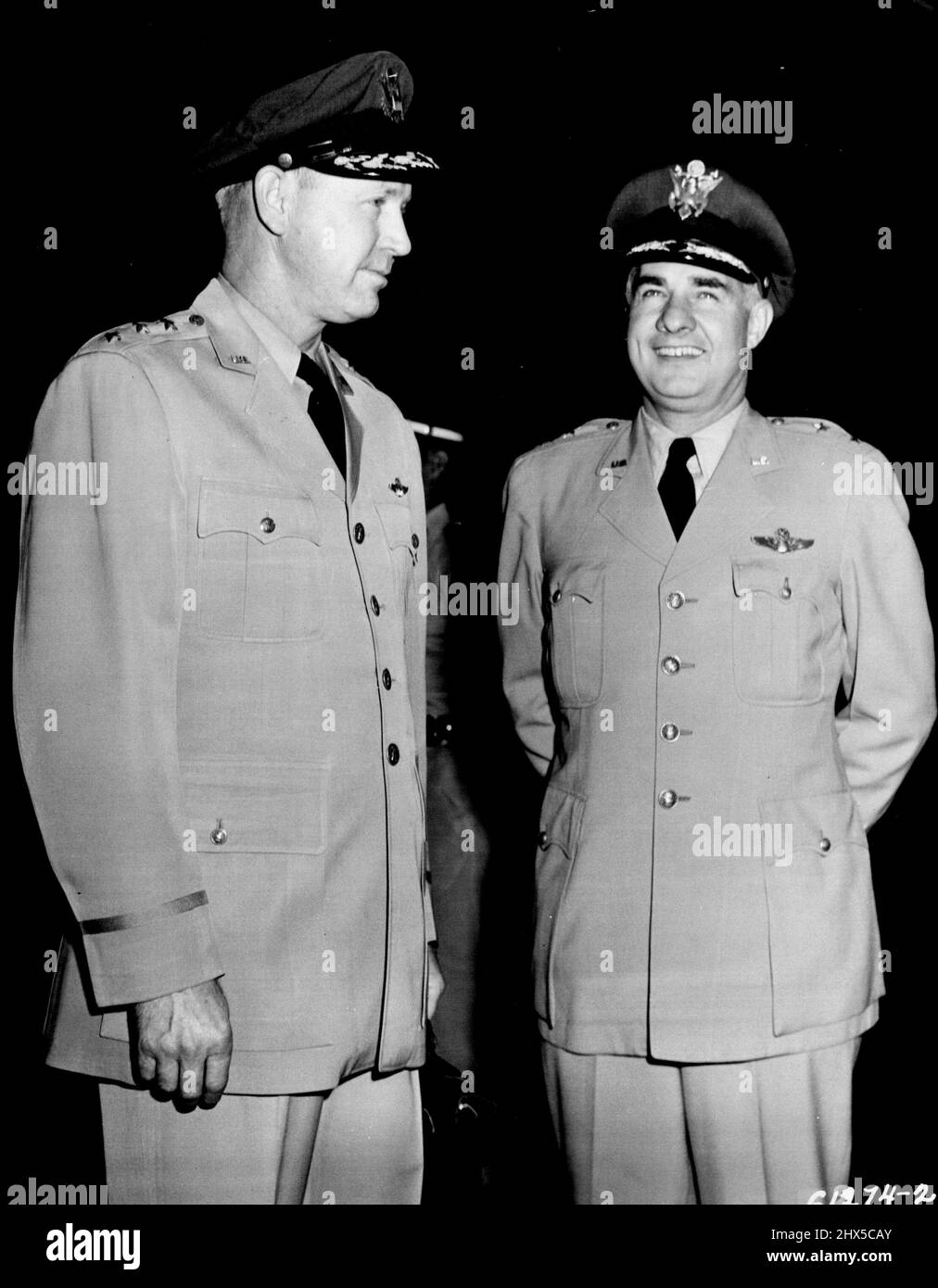 Lt. Gen. Otto P. Weyland, left, and Maj. Gen. Frank Everest, recently appointed commanders of the Far East Air Force and Fifth Air Force respectively, arrived at the Haneda Airport near Tokyo May 29. The two commanders succeed Lt. Gen. George E. Stratemeyer, relived due to illness, and Lt. Gen. ***** E. Partridge, scheduled for reassignment in the United States. May 30, 1951. (Photo by U. S. Air Force Photo). Stock Photo