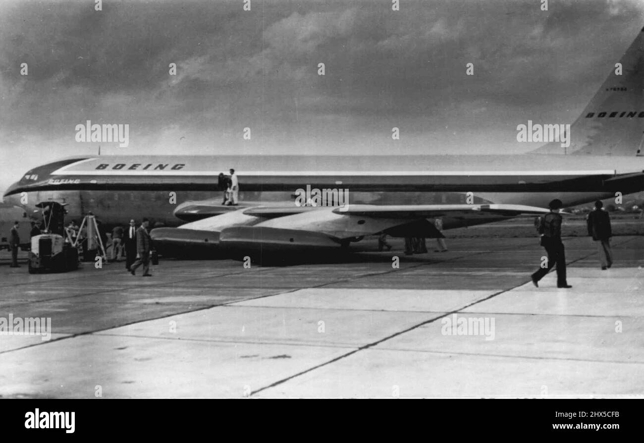 New Jetliner Damaged-Boeing's new 15-million-dollar Jet transport squats on runway after the left landing gear buckled during taxi tests late yesterday. A portion of the damaged wing flap can be seen above wing next to fuselage. The accident will delay first flight several weeks. Boeing engineers estimated. May 22, 1954. (Photo by AP Wirephoto). Stock Photo