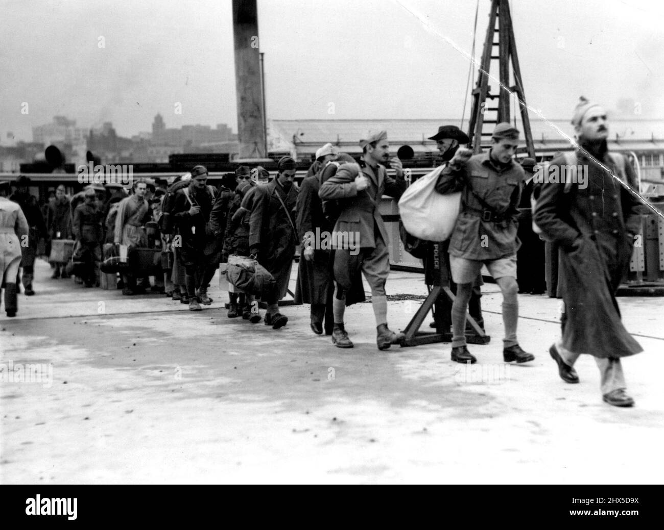 Italian officer prisoners who arrived in Sydney to-day ware allowed to take with them many of their personal effects. There was a high pile of baggage on the wharf. August 16, 1941. Stock Photo