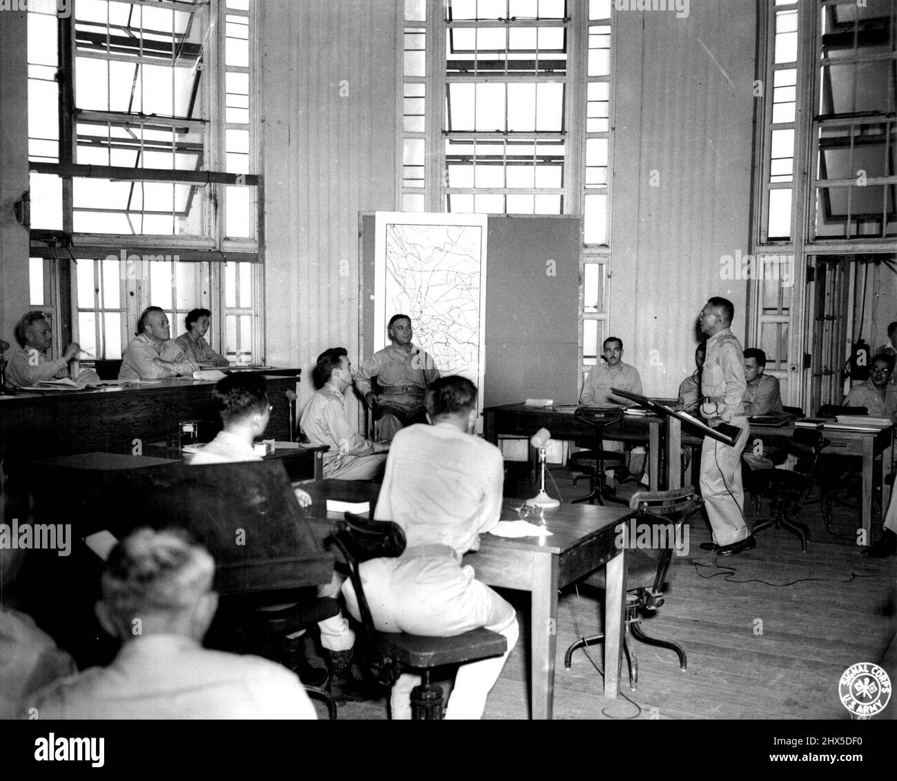 Gen. Valdez witness against Yamashita - Maj. Gen. Basilio J. Valdesz, chief of staff of the Philippine Army, in the witness chair as he gave testimony against Gen. Tomoyuki Yamashita. On trial in Manila as a war criminal. Maj. Glicerio opinion of the prosecution is questioning the witness. October 30, 1945. (Photo by U.S. Army Signal Corps Photo). Stock Photo