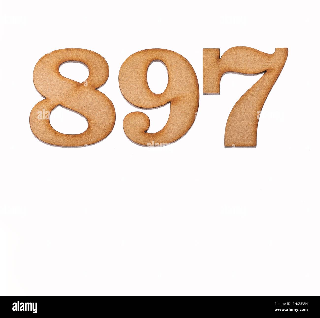 Number 897 in wood, isolated on white background Stock Photo Alamy