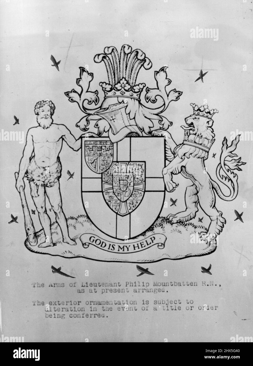 The arms of Lieutenant Philip Mountbatten R.N., as at present arranged. The exterior ornamentation is subject to alteration in the event of a title or order being conferred. Lieut Philip Mountbatten's Coat Of Arms - LT. Philip Mountbatten's coat of arms. The design bears the arms of Princess Alice, Lieut. Mountbatten's grandmother over all in the first quarter, on the arms of Denmark and Greece, and the lion of England gorged with a naval crown. The crest has five ostrich features derived from the Carisbrooke and Mountbatten arms. November 24, 1947. Stock Photo