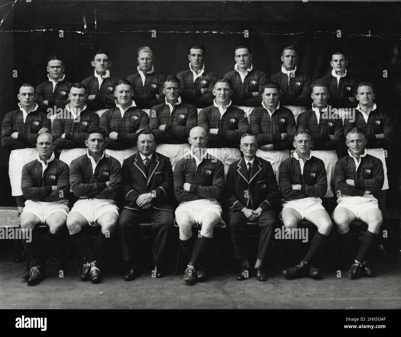 Australia's Rugby League team to tour N.Z. Left to right from back: F. Gilbert, E. Lewis, S. Goodwin, J. Gibbs, M. Shields, L. Ward, G. K. Whittle, E. Collins, R. Stehr, F. Curran. H. Bichel, S. Pearce, R. Hines. W. Prigg, R. McKinnon, E. Norman, W. Mahon, H. Sunderland, D. Brown (capt). W. J. Chaseling, V. Thicknesse, and P. Fairall. September 23, 1935. Stock Photo