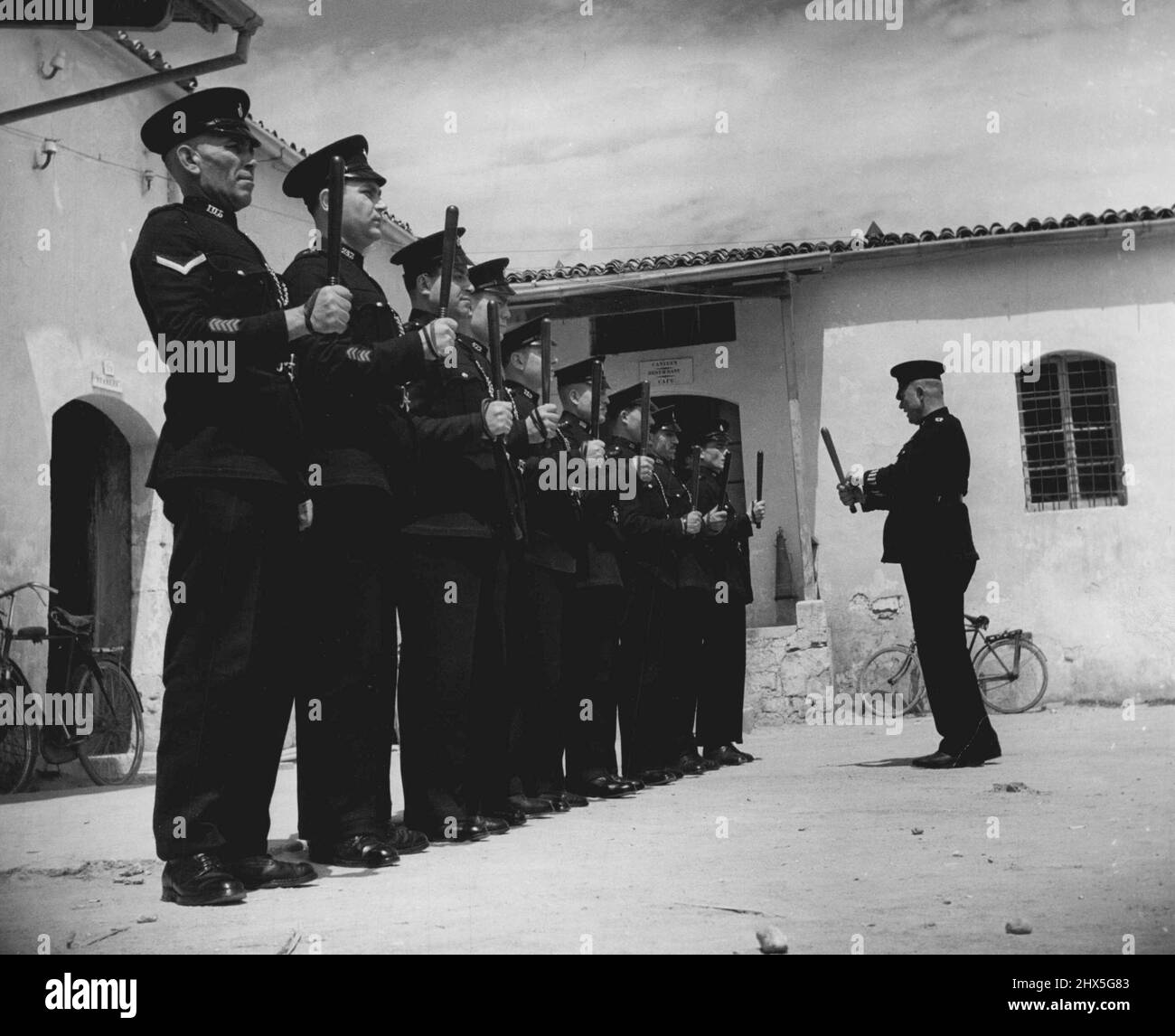 Cyprus Police. Truncheon inspection at the Nicosia Divisional H.Q. July 1, 1951. (Photo by British Official Photograph). Stock Photo