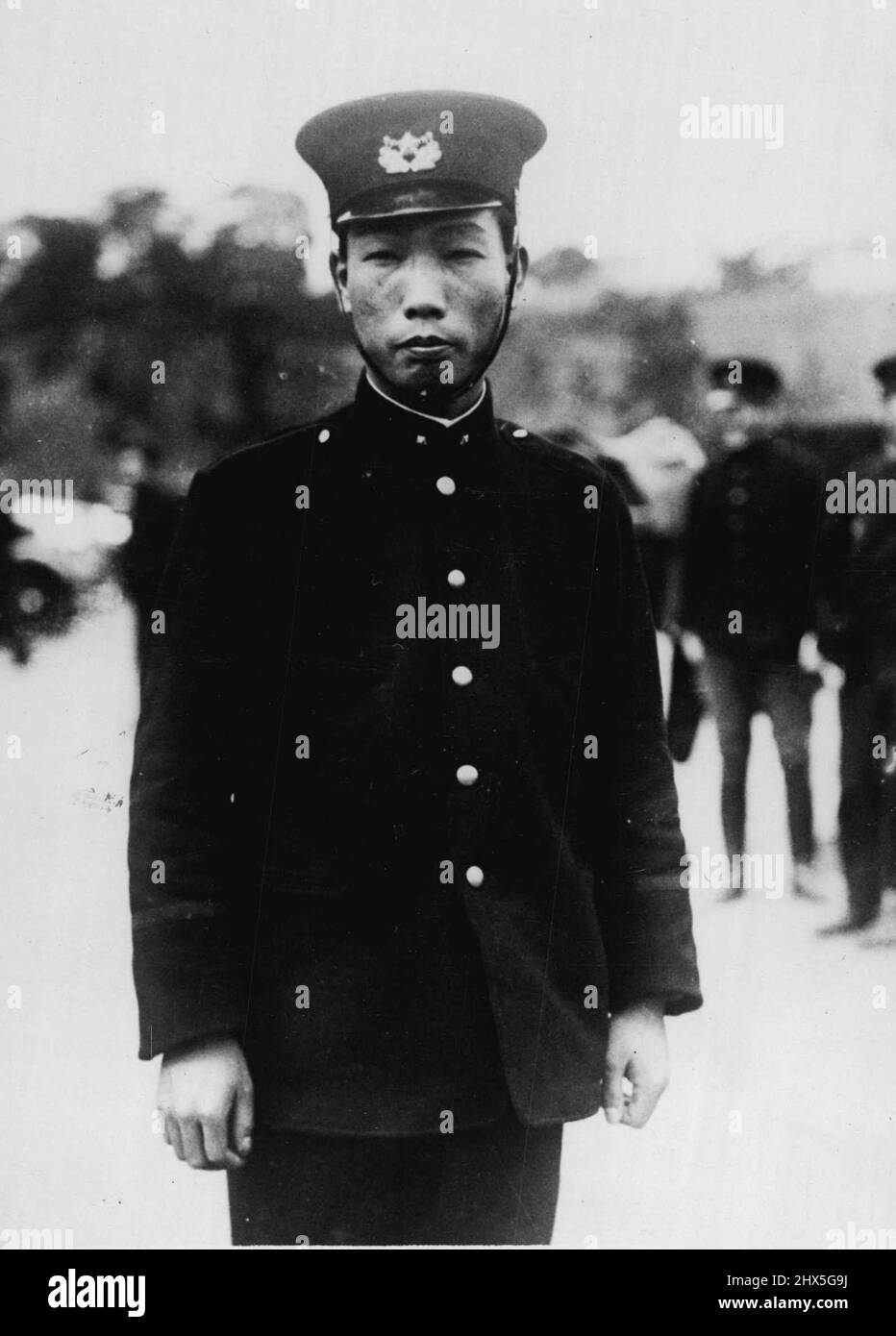 Attempted Assassination of the Emperor of Japan - The policeman who caught the Assassin after the attempt on the emperor's life. March 17, 1932. (Photo by Associated Press Photo). Stock Photo