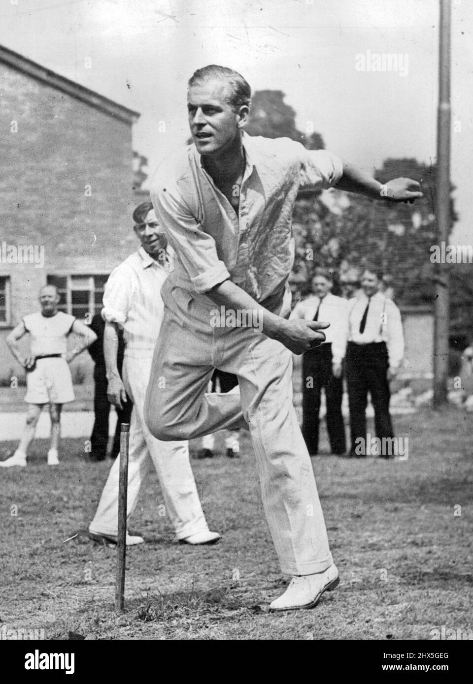 Britain's Sporting Royal Couple -- Their Royal Highnesses Princess Elizabeth and the Duke of Edinburgh. The Duke of Edinburgh who is an enthusiastic cricketer is here taking a turn at bowling at the ***** when this picture was taken Lieutenant Mountbatten ***** was an instructor at the Petty Officers Training Centre at Corsham. The Duke's ability as an off-spinner has been commended sincerely by such a competent judge as Bradman. The Duke of Edinburgh shows his own bowing style. March 6, 1955. Stock Photo