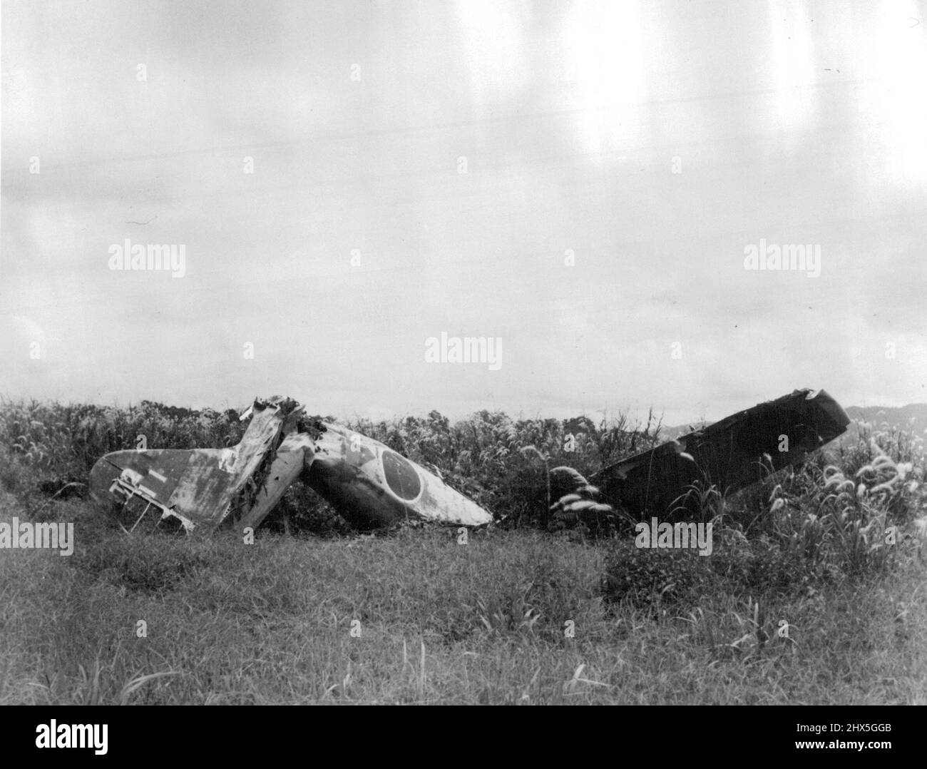 New Britain: A wrecked Japanese fighter plane on the Gasmata airstrip. It is a HAMP type zero fighter. May 01, 1944. (Photo by Commonwealth Department of Information). Stock Photo