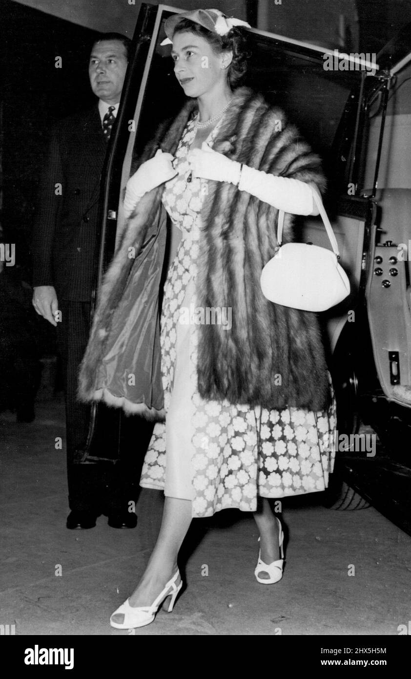 Queen Arrives For Royal Tournament Queen Elizabeth II is seen arriving at Earl's Court to-day for the Royal Military Tournament now in progress there. June 9, 1954. Stock Photo