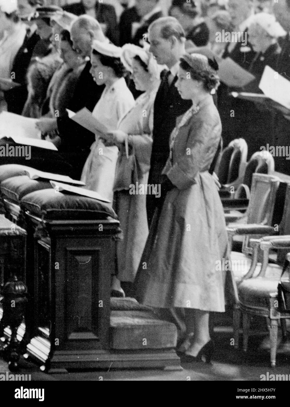 Queen And The Duke Go To St. Paul's Service The Queen, with the Duke of Edinburgh and Queen Elizabeth the Queen Mother are pictured during the Coronation Thanksgiving Service at St. Paul's Cathedral, London, to-day. The Queen drove from Buckingham Palace to attend the service, at which Dr. Fisher, the Archbishop of Canterbury, preached the sermon. Sir Winston Churchill, the Prime Minister, read the lesson. June 6, 1953. Stock Photo