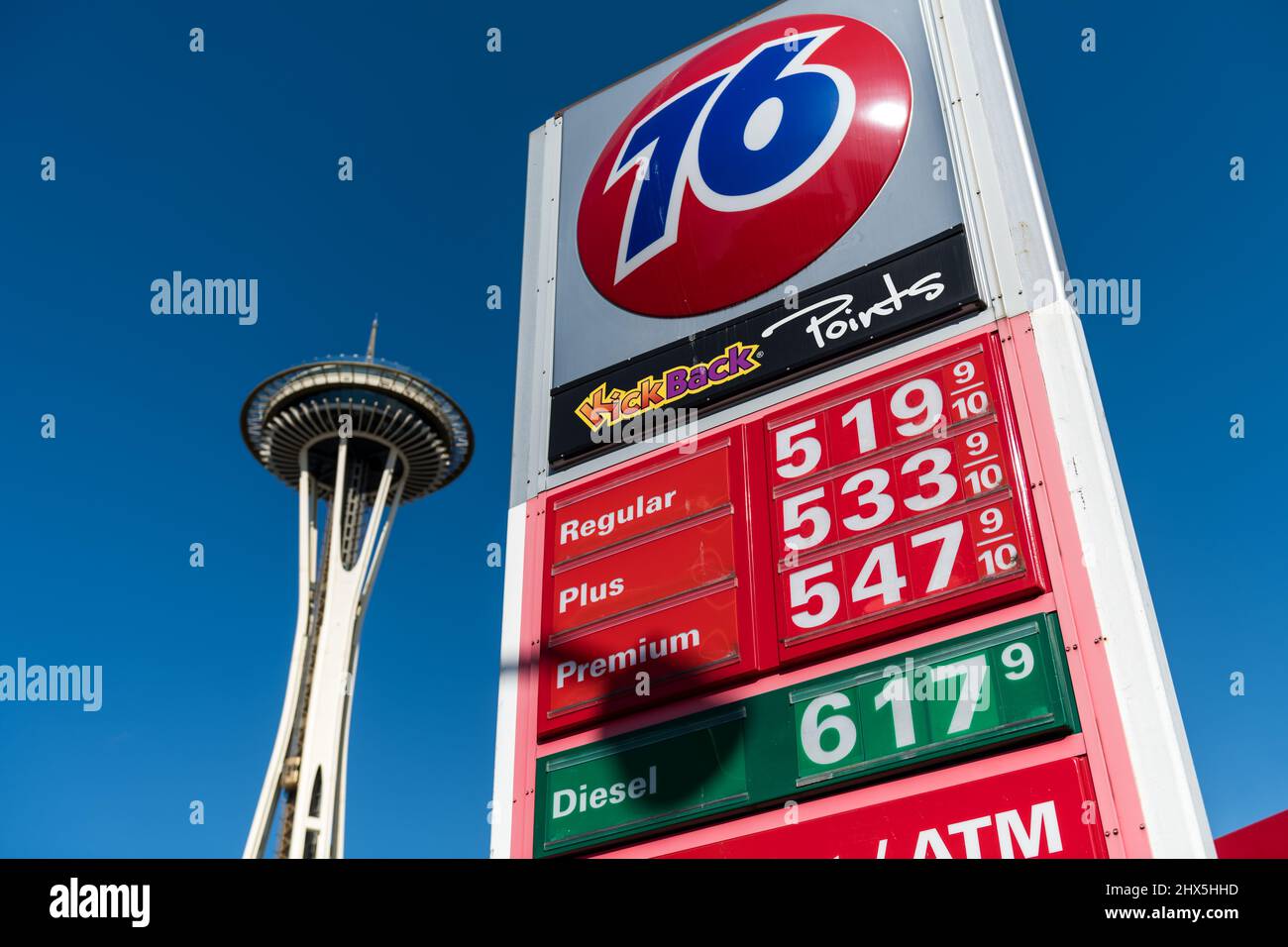 Seattle, USA. 9th Mar, 2022. Pain at the pump in the shadow of the Space Needle on Denny way. Unleaded fuel breaching the five dollar a gallon mark. Gas prices are still surging across the United States after Russia’s invasion on Ukraine on the 24th of Feb. Struggling Americans are dealing with skyrocketing inflation and increasing rents as Covid-19 restrictions lessen and the world opens up. James Anderson/Alamy Live News Stock Photo