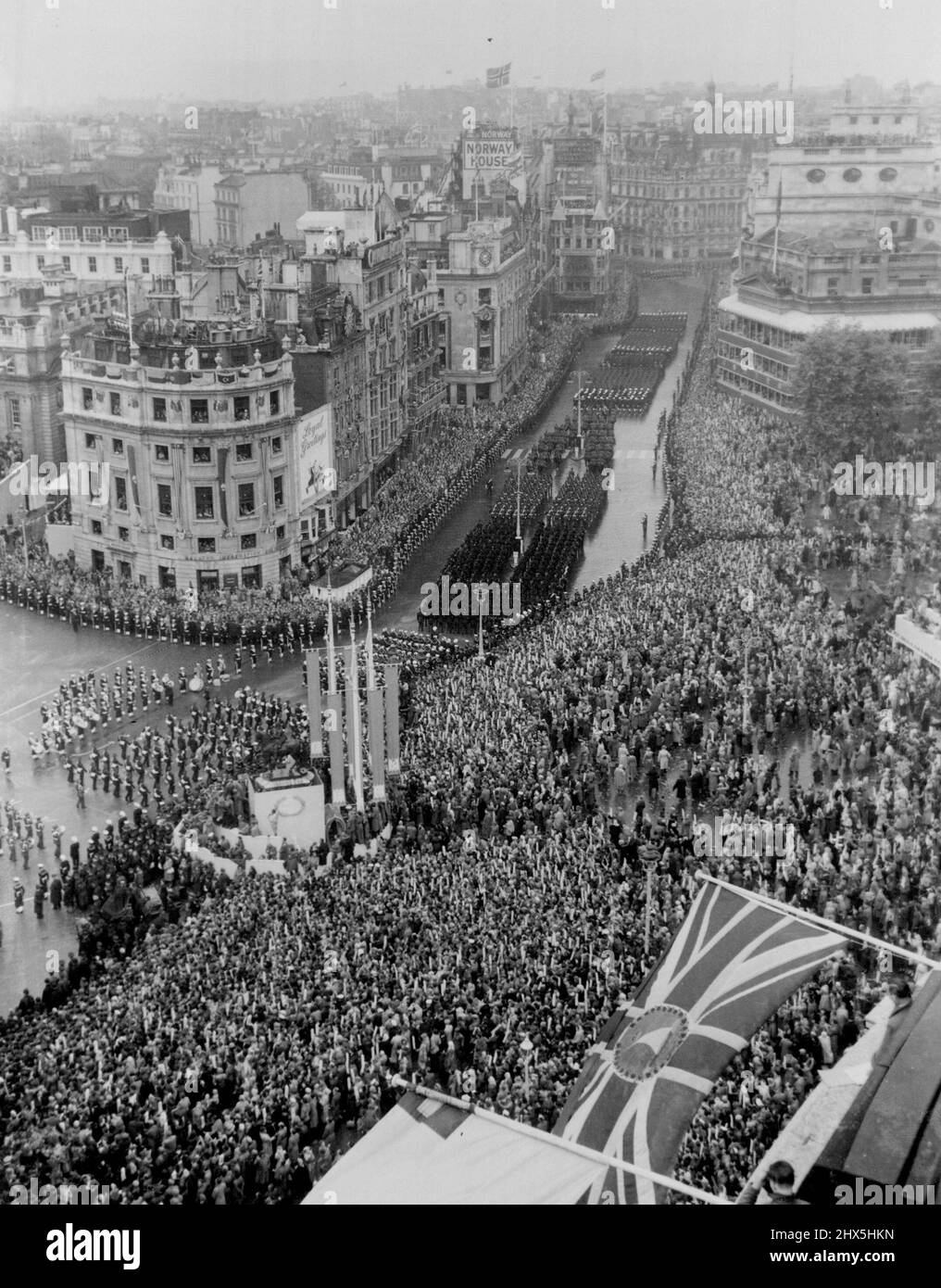 Coronation Procession Returns After Queen crowning -- Commonwealth contingents passing along Cockspur Street, near Trafalgar Square, during the return procession from Westminster Abbey after the crowning there of Queen Elizabeth to-day (Thursday). June 02, 1953. Stock Photo