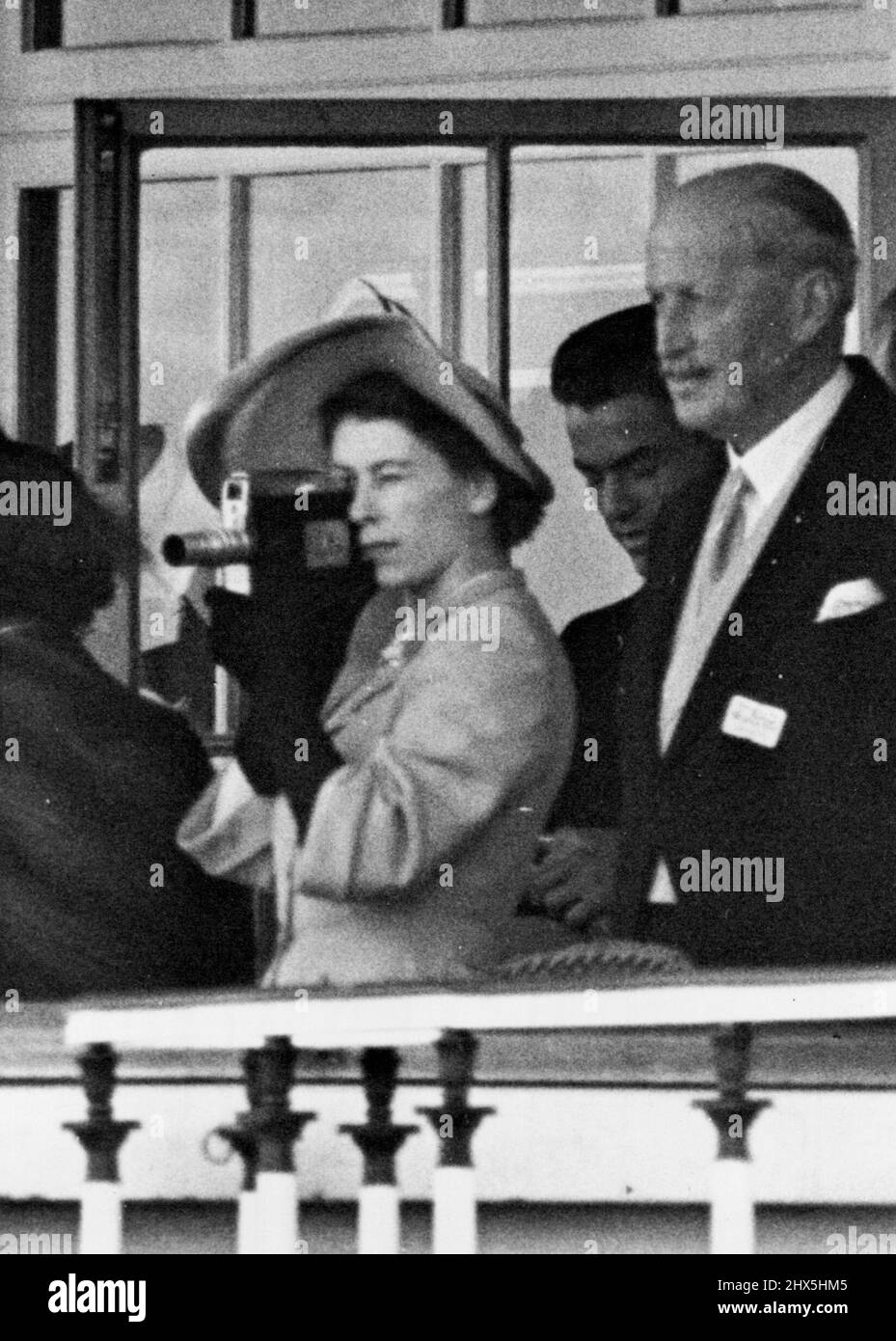 Princess Elizabeth Films The Ascot Gold Cup -- Princess Elizabeth taking pictures of the Ascot Gold Cup with her cine camera. June 14, 1951. (Photo by Fox Photos). Stock Photo