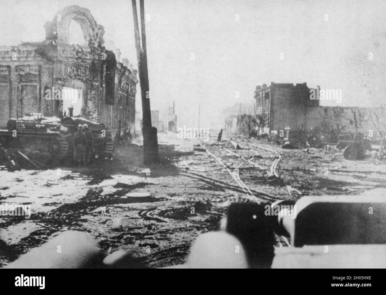 Desolation In Stalingrad -- Except for two German ***** beside a wrecked tank at left, this section of Stalingrad scene of desolation when a German photographers made this picture October. Since that time, the Russians have ***** Ensive. Photo reached New York neutral *****. December 9, 1942. (Photo by AP Wirephoto). Stock Photo
