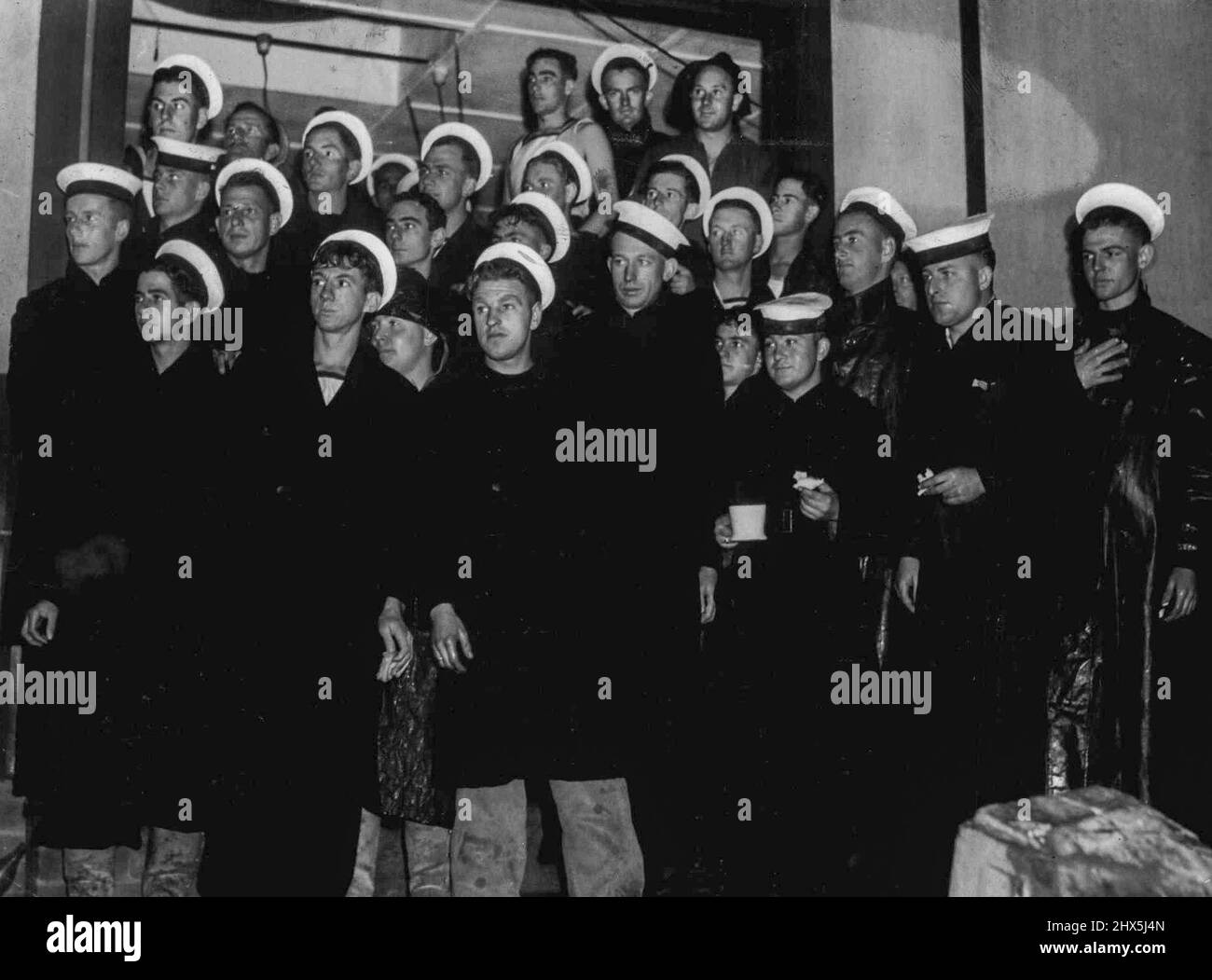This group of survivors from the naval depot ship sunk by enemy action on Sunday night had been sleeping aboard when a torpedo hit the vessel. June 10, 1942. Stock Photo